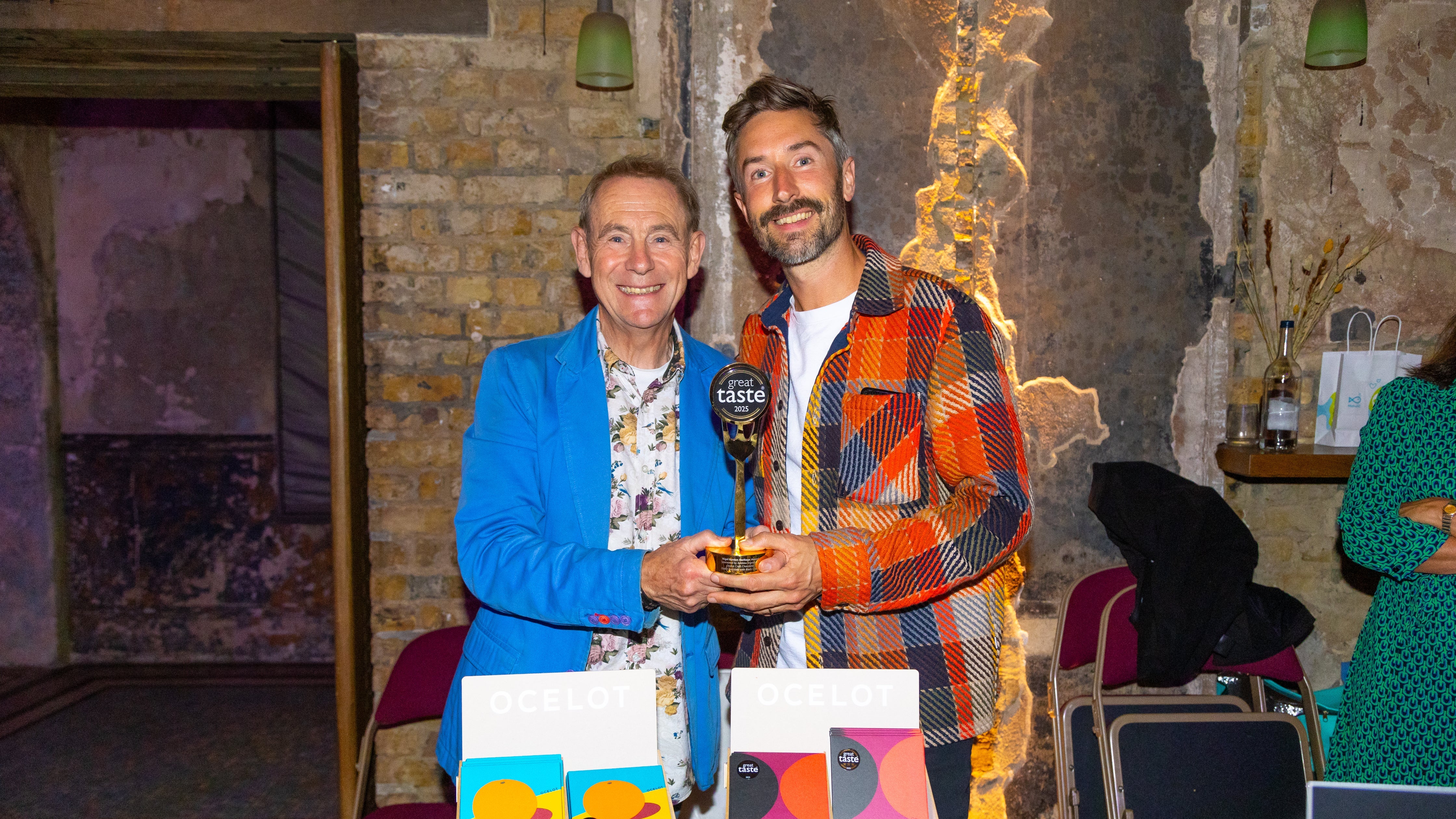 Matt of Ocelot Chocolate receiving the Heritage Award from Nigel Barden at the 2025 Great Taste Awards
